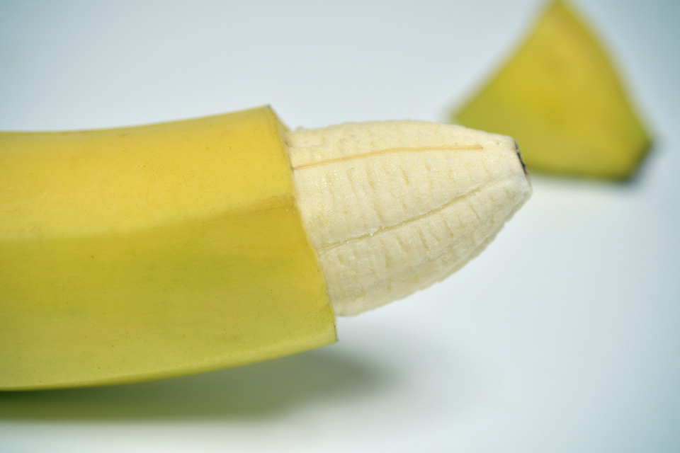 banana with the skin of its tip removed